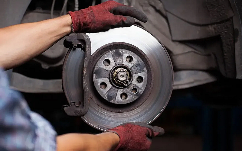 Brake pad service at Ahdab Auto repairing workshop for Just AED