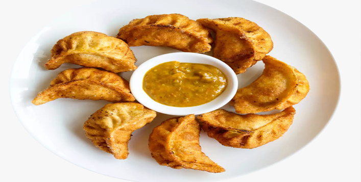 Unlimited veg or non-veg Momos; valid daily